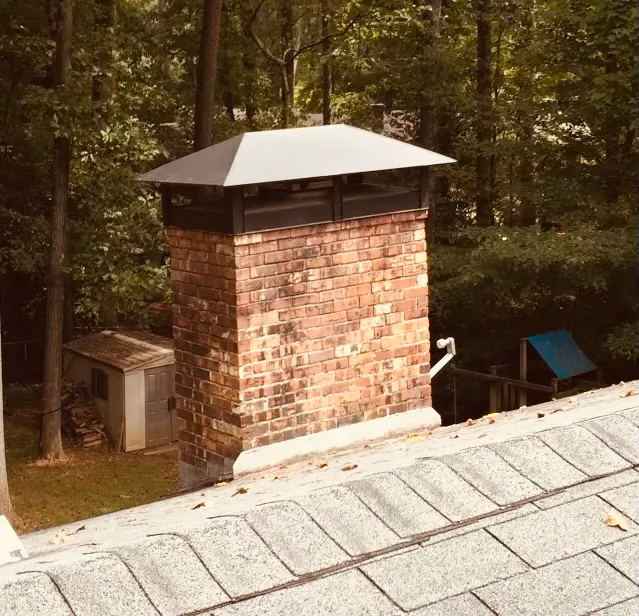 custom chimney cap | hip and ridge chimney cap | masonry chimney cap