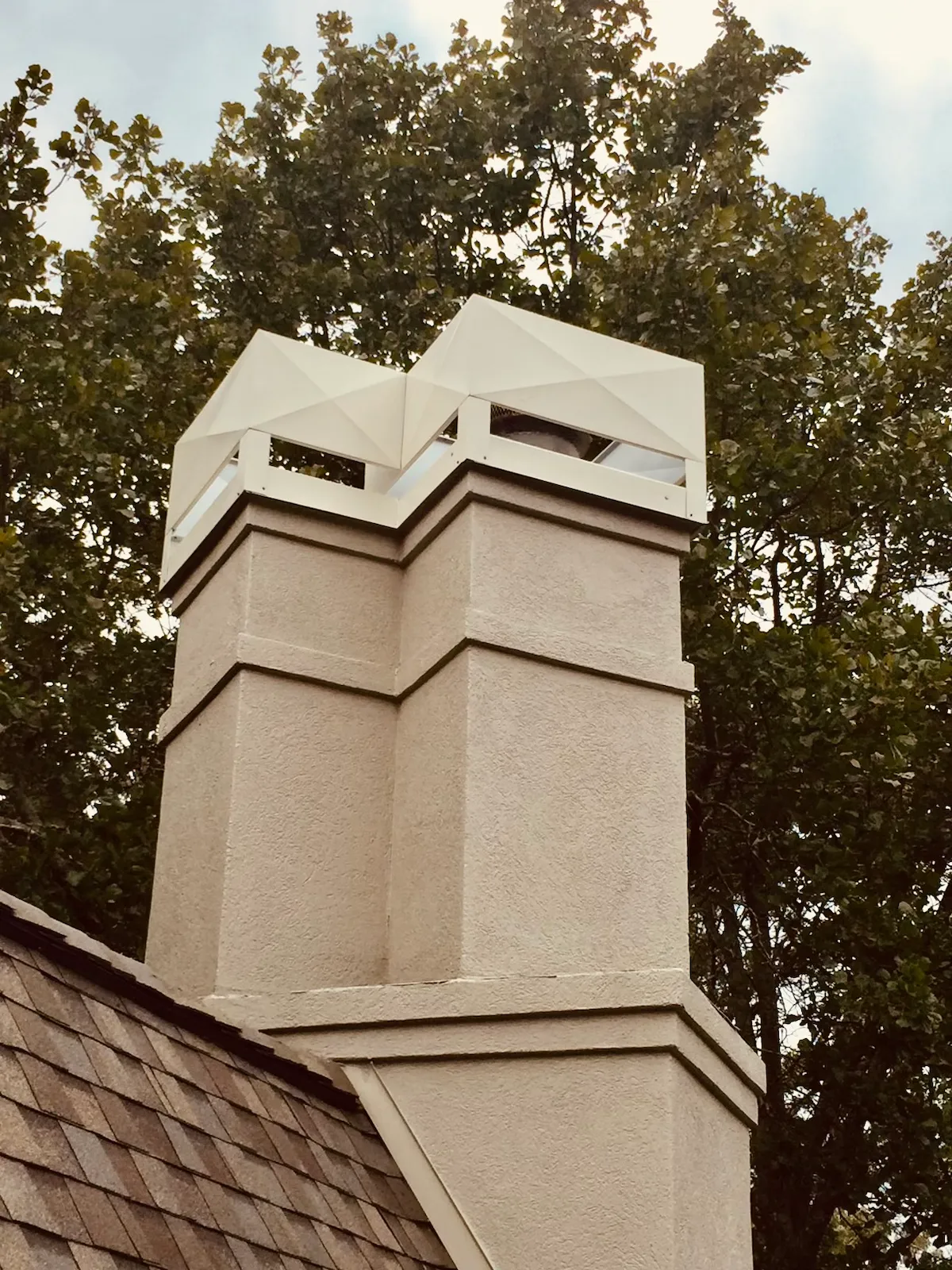 custom chimney cap install | custom chimney shroud | decorative chimney shroud